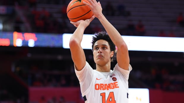 Nov 30, 2021; Syracuse, New York, USA; Syracuse Orange center Jesse Edwards (14) shoots a free throw against the Indiana Hoosiers during the second half at the Carrier Dome. Mandatory Credit: Rich Barnes-USA TODAY Sports